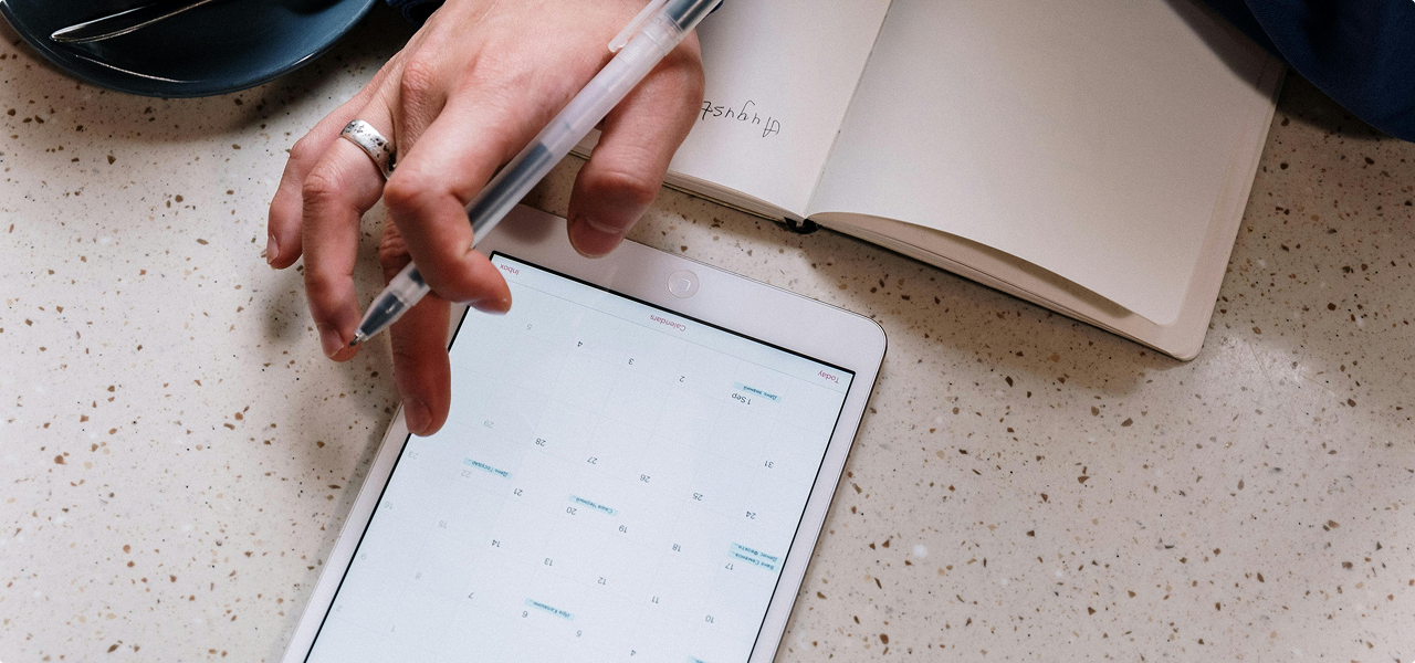 Planning with tablet and notebook